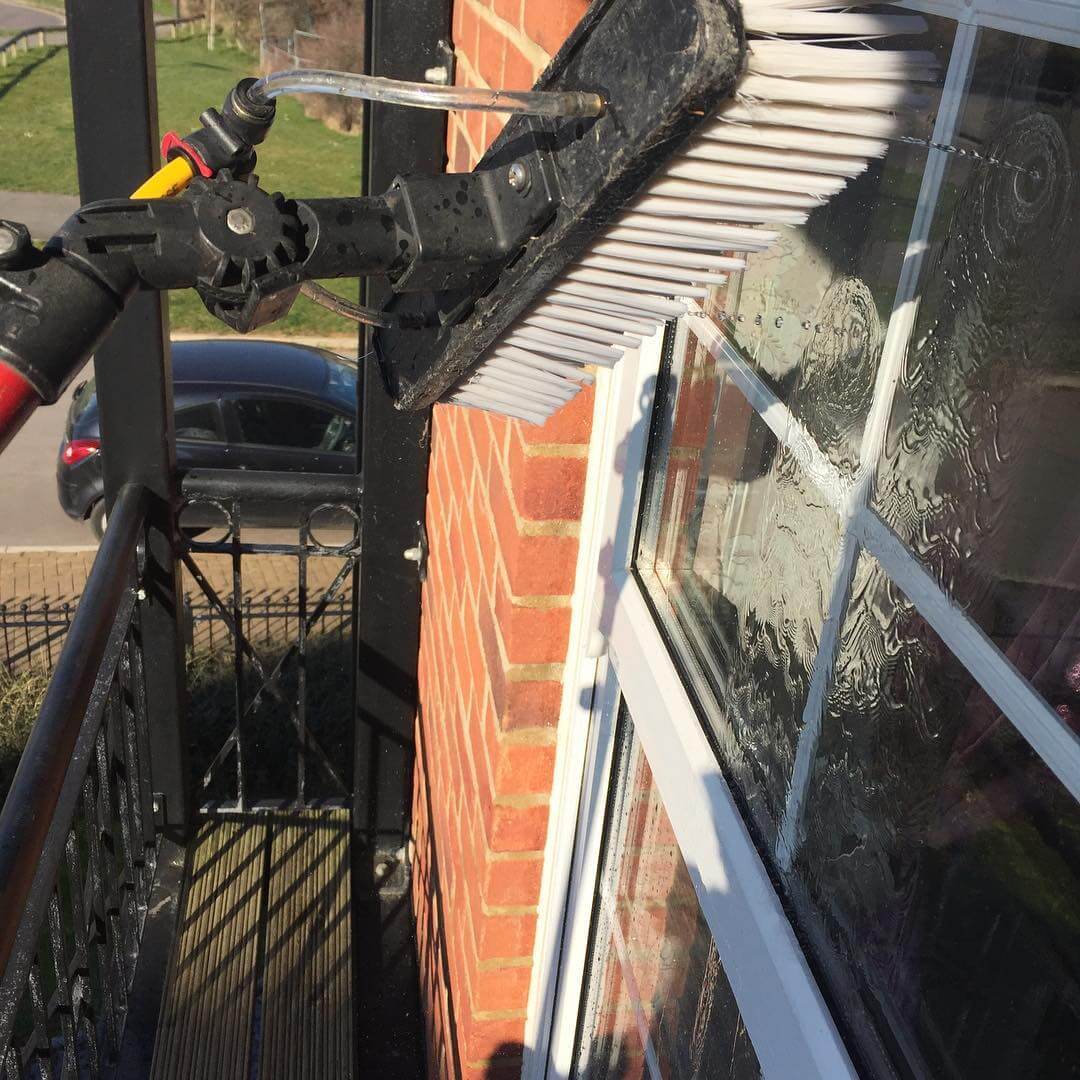 window cleaning a high building